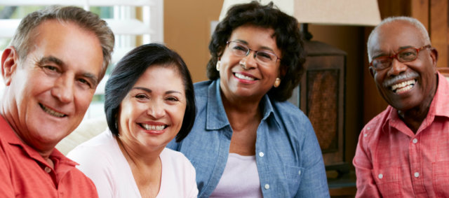 two senior couple smiling